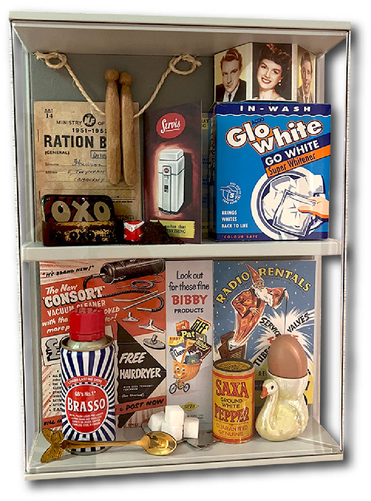 Dementia friendly themed Memory Box filled with era-specific cleaning products and other artefacts relating to a typical 1960's home to stimulate conversation and reminiscence
