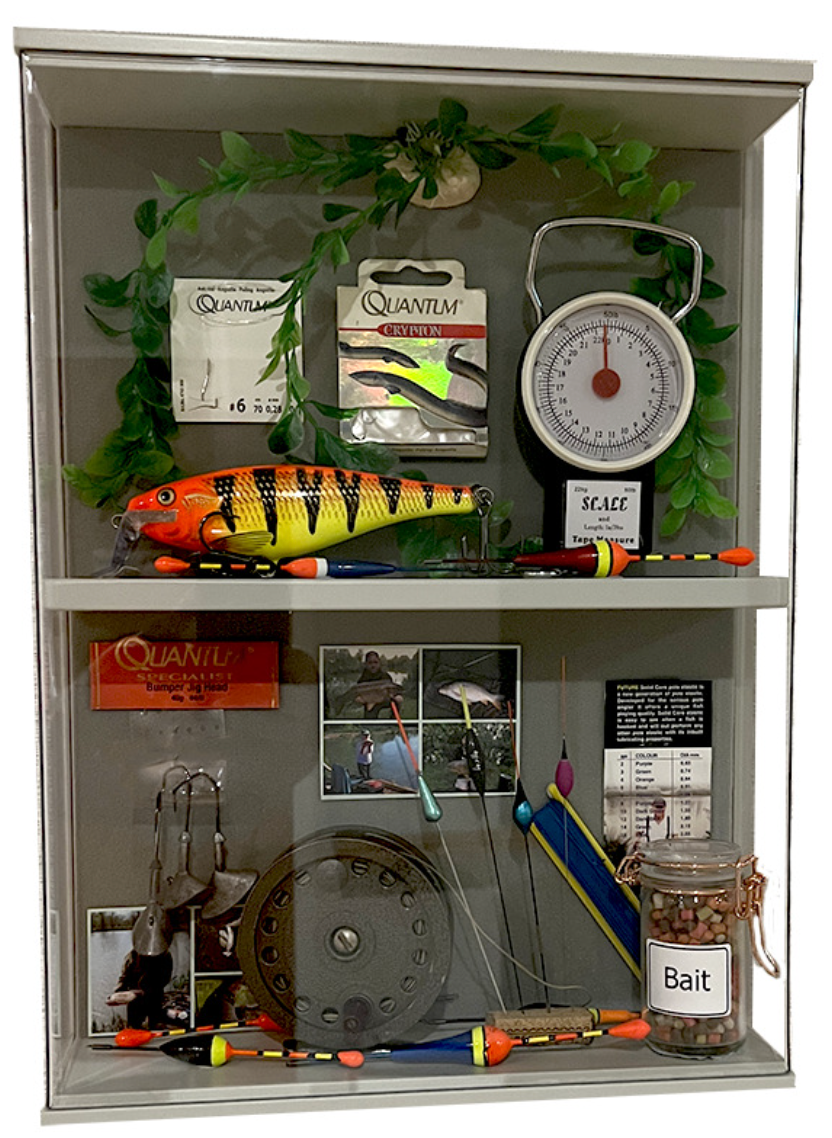 Dementia themed memory box containing fishing related artefacts