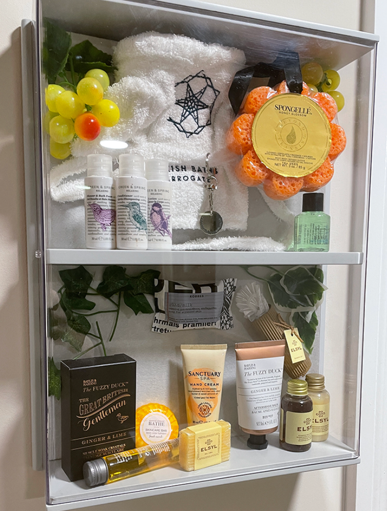 Spa and pampering related items displayed in a dementia friendly memory box for care home display