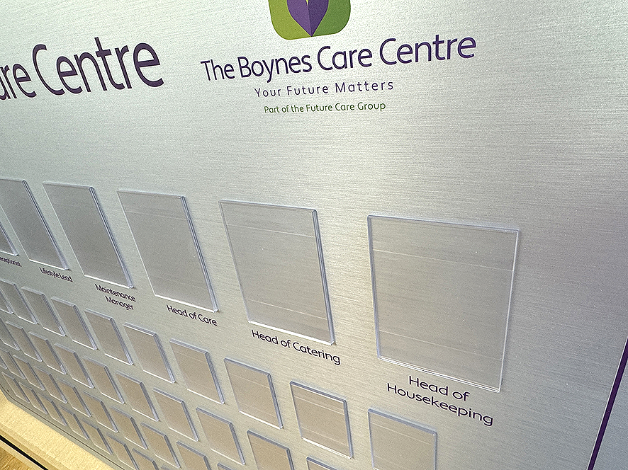 Brushed Silver finished bespoke staff photo display board including job titles