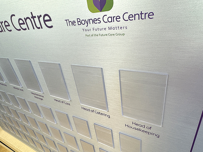 Brushed Silver finished bespoke staff photo display board including job titles
