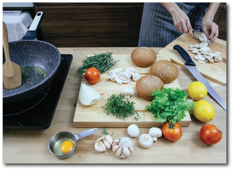 Dementia-friendly reminiscence artwork of a chef preparing various fresh vegetables for a stir fried dish.