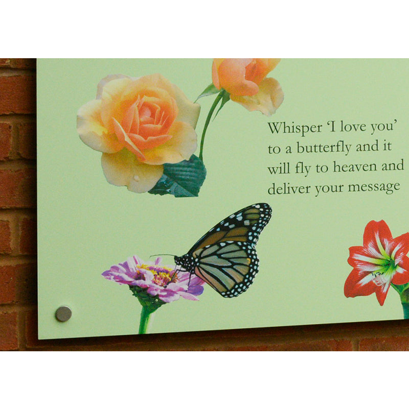 Close up on a delightful reminiscence display artwork with pictures of flowers, animals, birds and butterflies commonly found in English gardens. Including sound bites and poetry relating to happy memories of gardening.